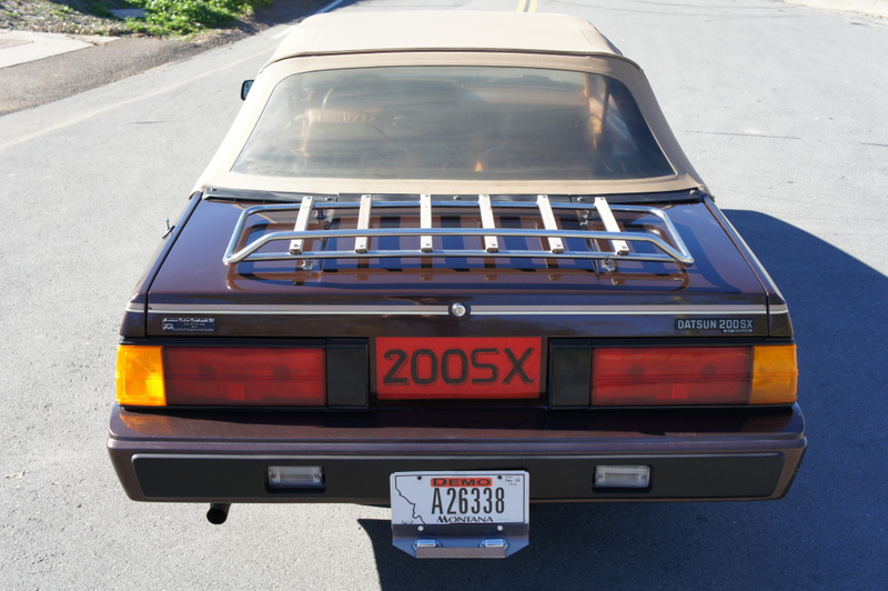 Illustration for article titled For $6,500 — top down and brown, loaded up and Datsun
